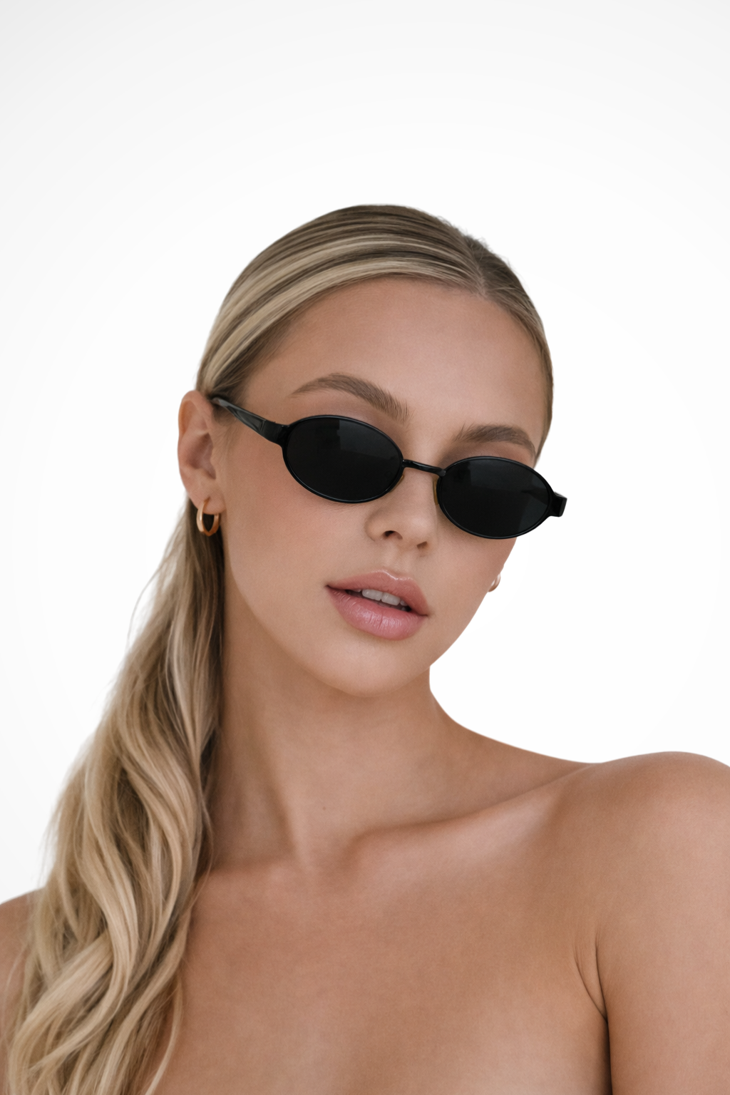 Women's Oval Sunglasses with Slim Frame and UV Protection